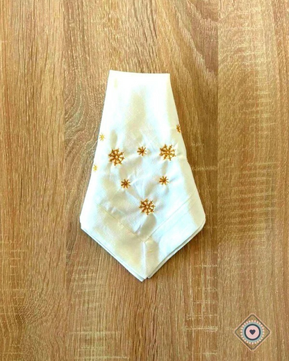Servilleta de Tela Bordada color blanco invierno Copos de nieve dorados