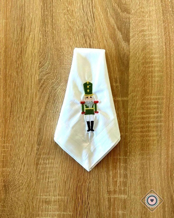 Servilleta de Tela Bordada color blanco Cascanueces verde